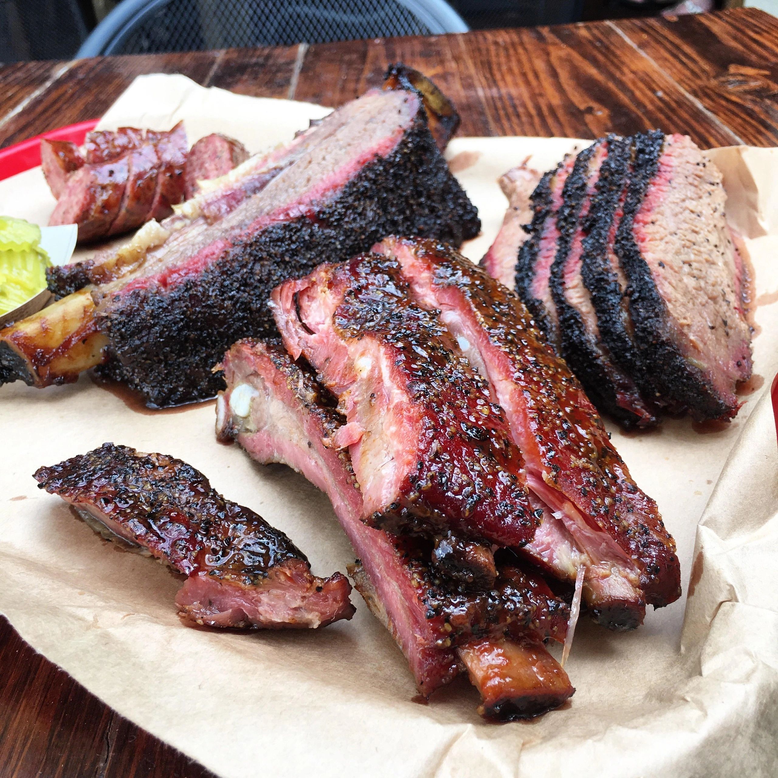 Sliced BBQ brisket on butcher paper